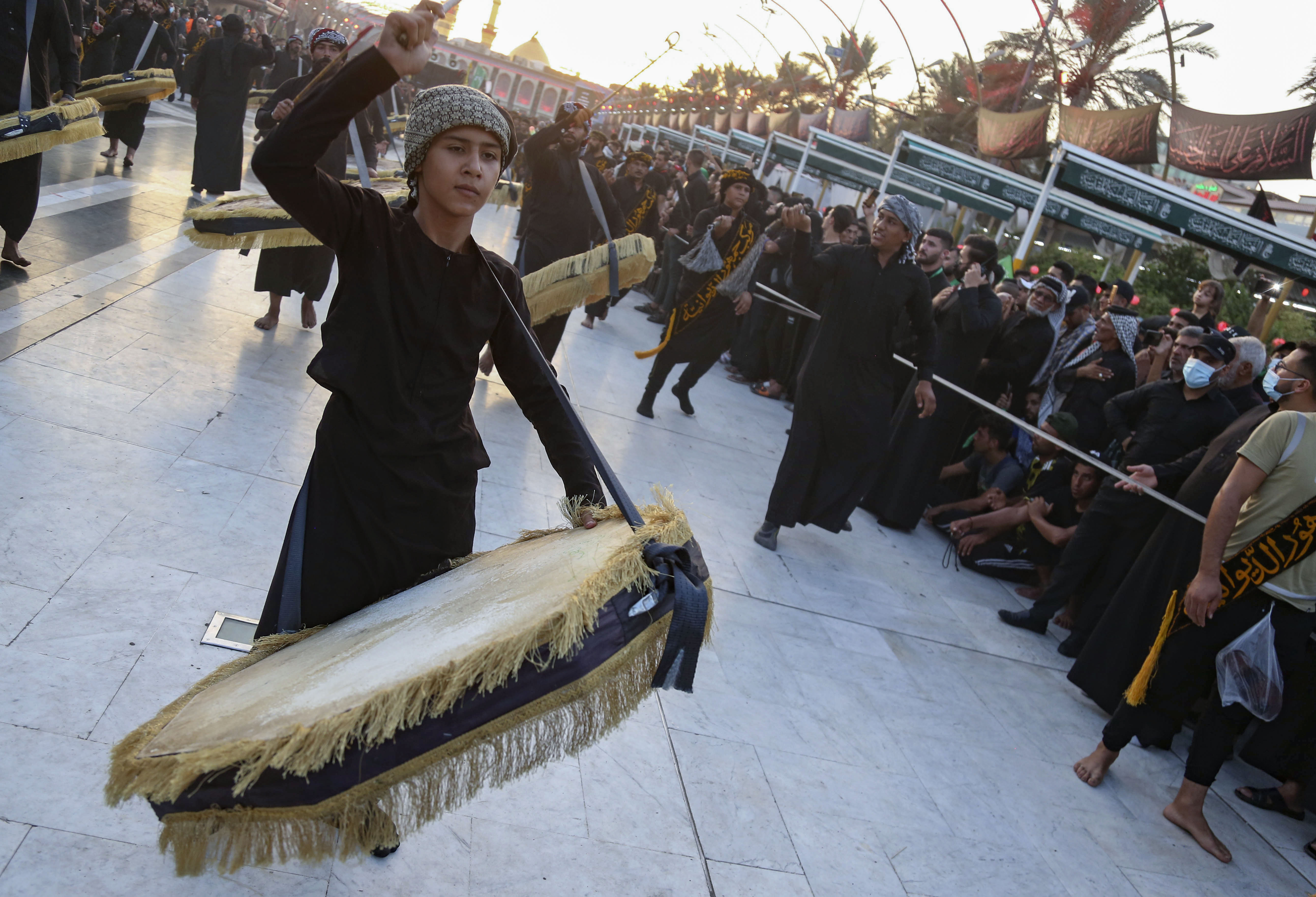 Shia Muslim men take part in a ritual ahead of Arbaeen, which marks the end of the 40-day mourning period for the seventh-century killing of Imam Hussein, Oct. 5, 2020. (Photo: AFP/Mohammed Sawaf)